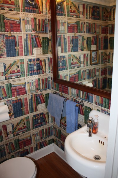 Our powder room is currently styled the bibliotheque but is in for a continental change.